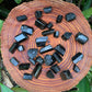 Underside view of Black Tourmaline raw stone, for Protection and Grounding, Madagascar-sourced.