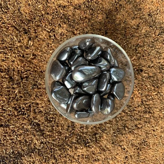 Top angle of Grade AA Hematite tumbled stone, from Minas Gerais, Brazil, associated with Grounding.