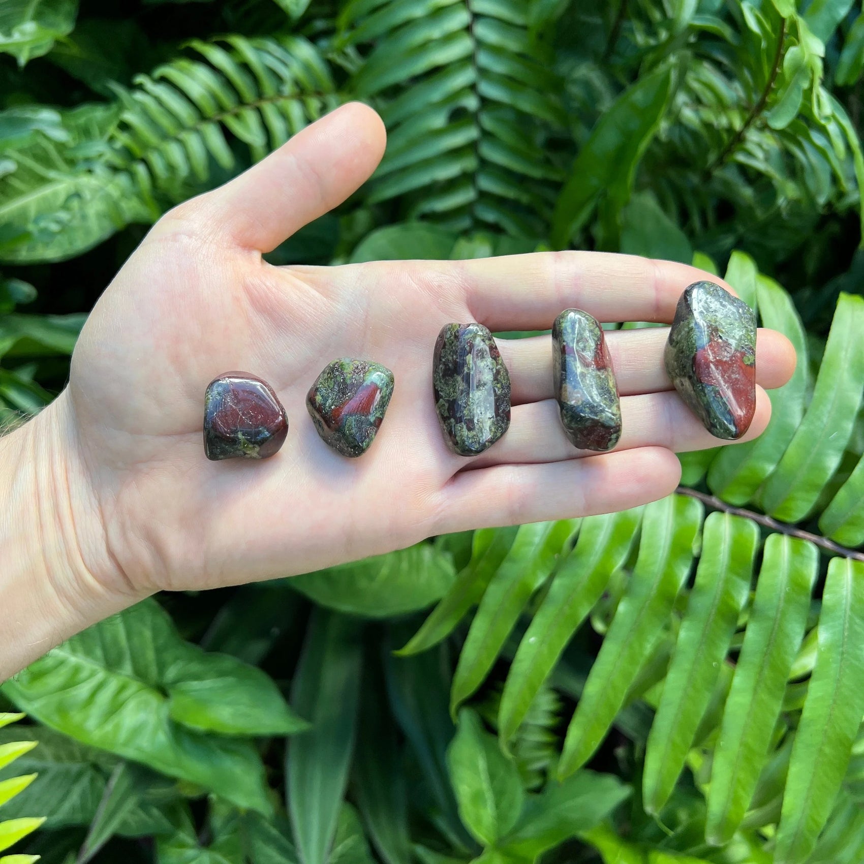 Close-up of Dragon Bloodstone tumbled stone from South Africa, soothing wellness stone for Energy