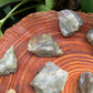 Detail shot of Grade A Labradorite raw under natural light