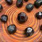 Size comparison with one Garnet raw stone for scale, Brazil-sourced.