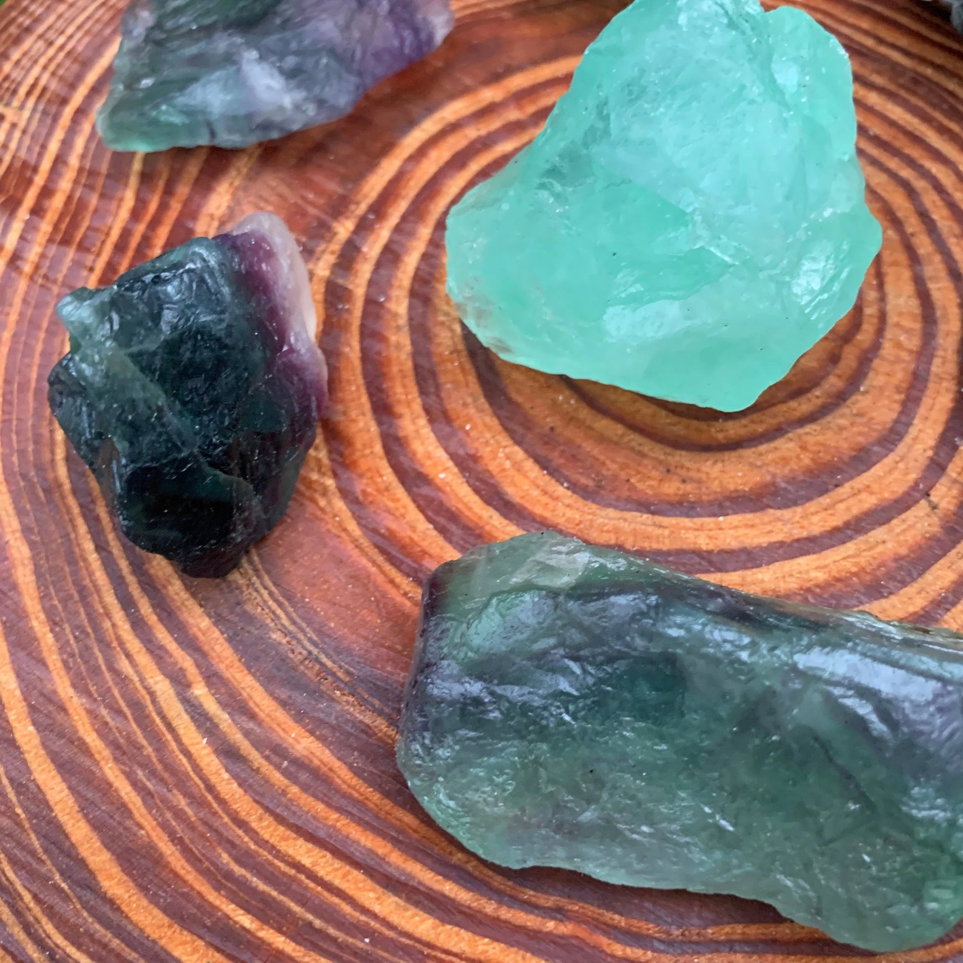 Back view of Grade AA Fluorite raw showing natural surface
