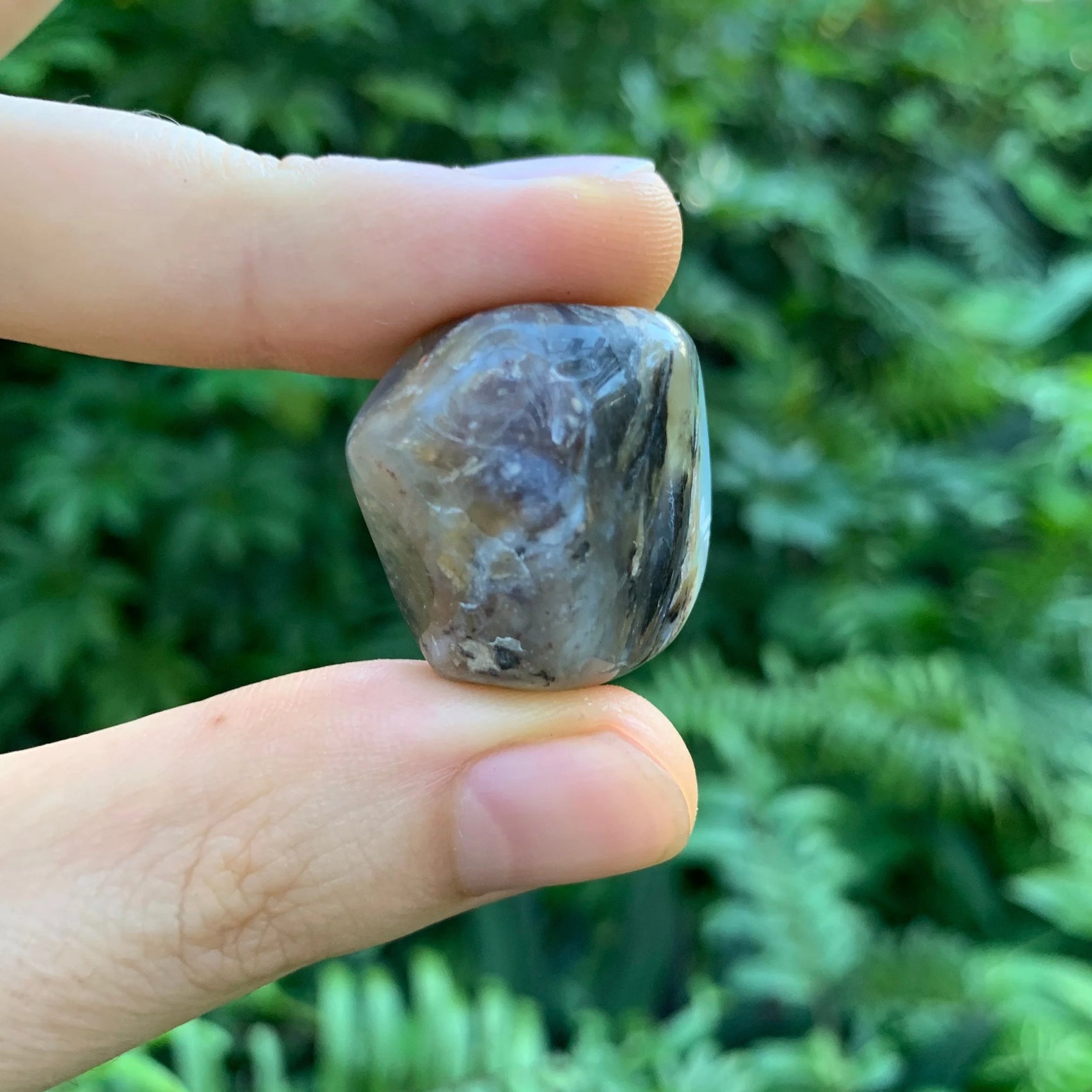 Underside detail of Blue Opal tumbled stone, associated with Emotional Healing and Stress Relief, hand-selected from Arequipa.
