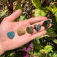 Back view of Grade A Ocean Jasper tumbled stone showing natural surface