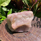 Back view of Grade AA Rose Quartz specimen showing natural surface