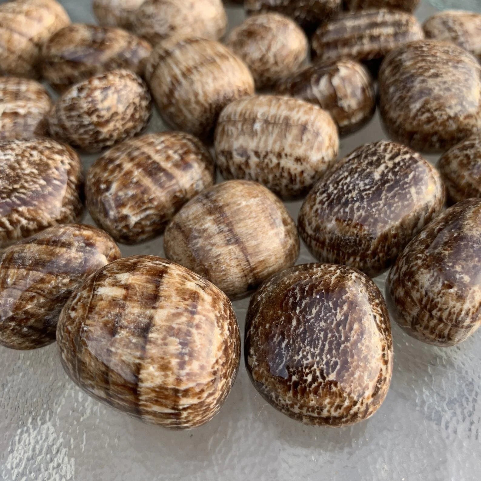 Full profile of Grade AA Brown Aragonite tumbled stone ready to ship from Beyond Bohemian