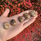 Full profile of Grade AA Brown Aragonite tumbled stone ready to ship from Beyond Bohemian