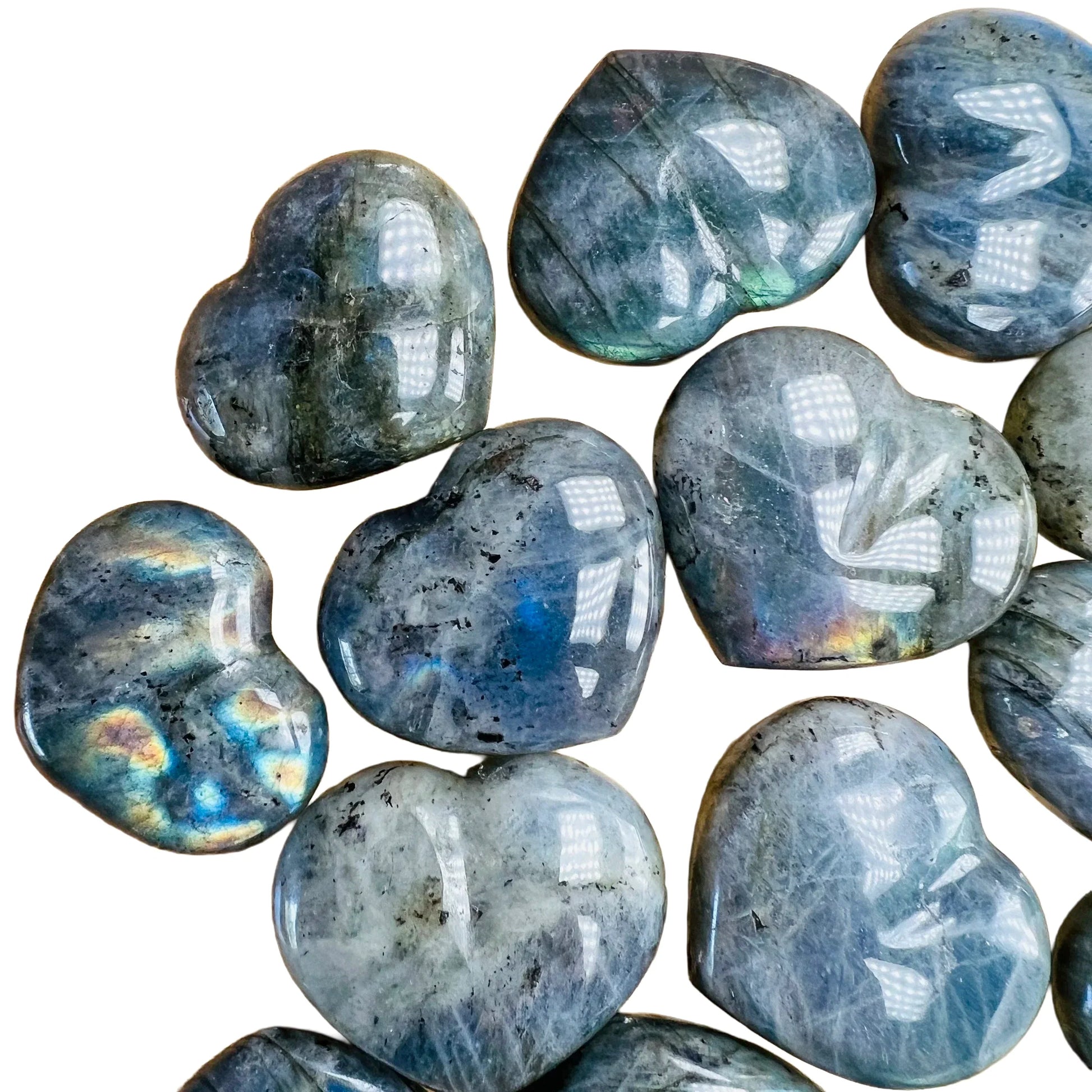 Profile shot of Labradorite polished heart, showing matte finish.