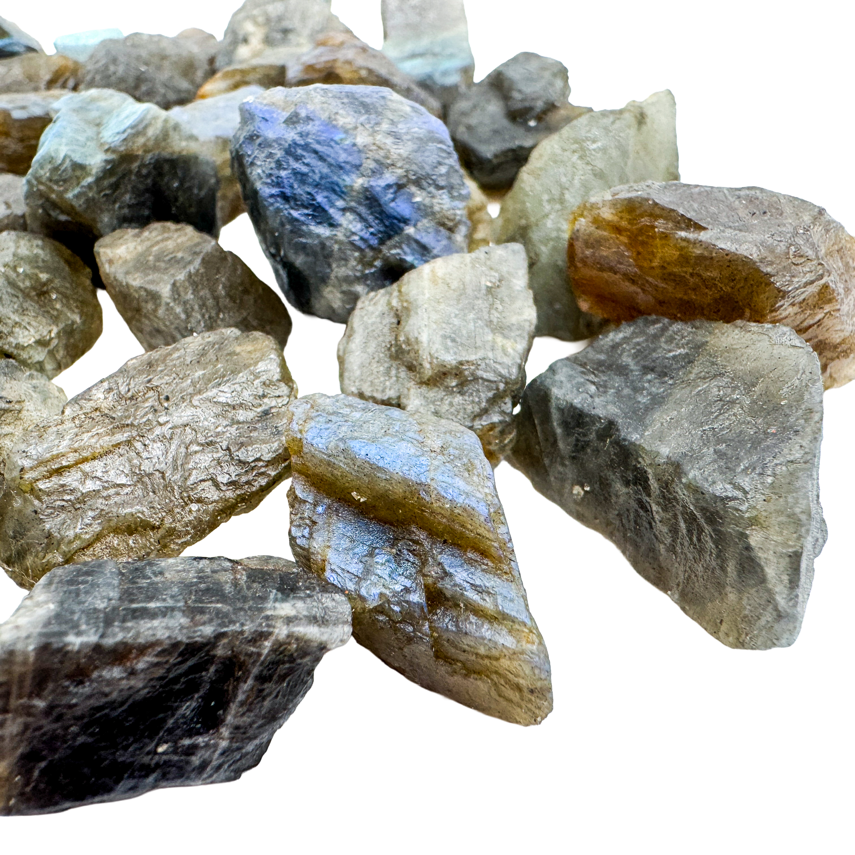Close-up of Labradorite rainbow raw stones showing blue labradorescence on natural rough surfaces, AA grade