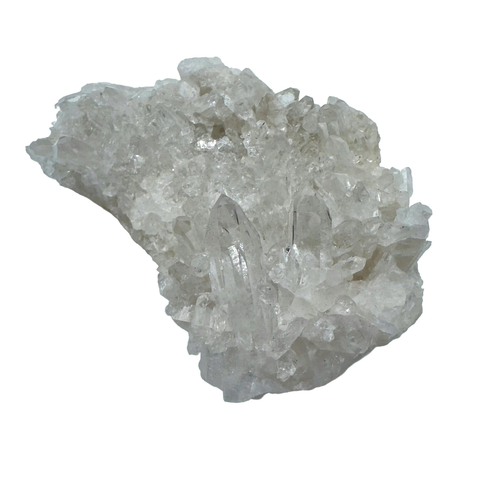 Holding a Clear Quartz specimen, from Rio Grande do Sul, Brazil, set against a soft neutral surface.