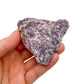 Palm-scale view of a single Lepidolite specimen from Brazil.