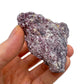 Soft-light view of Lepidolite specimen, often kept for Sleep, with surface texture in view.