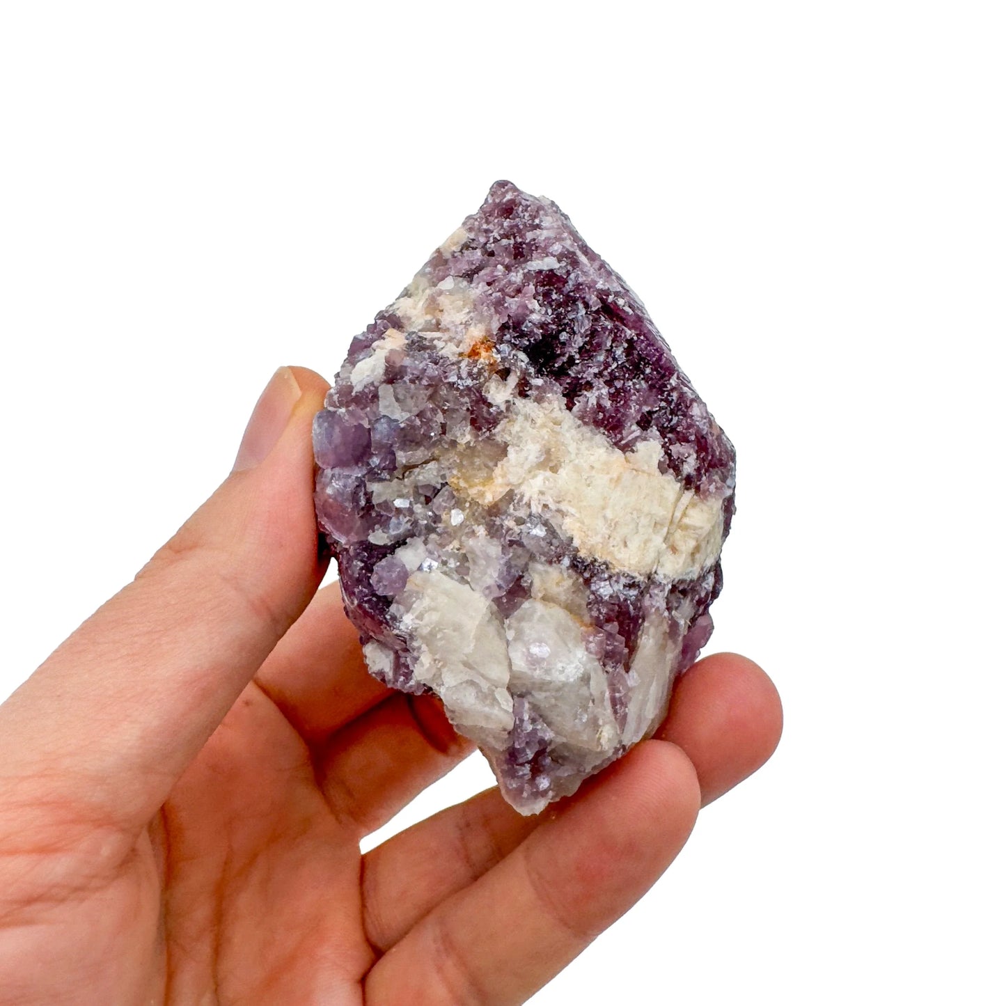 Whole-piece view of Lepidolite specimen, from Minas Gerais, Brazil, often kept for Stress Relief, set to give a sense of weight.