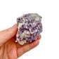 Detail shot of Grade AA Lepidolite cluster under natural light
