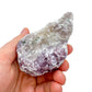 Detail shot of Grade AA Lepidolite cluster under natural light