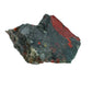 On a soft surface rests a Bloodstone specimen, associated with Grounding, showing natural surface character.