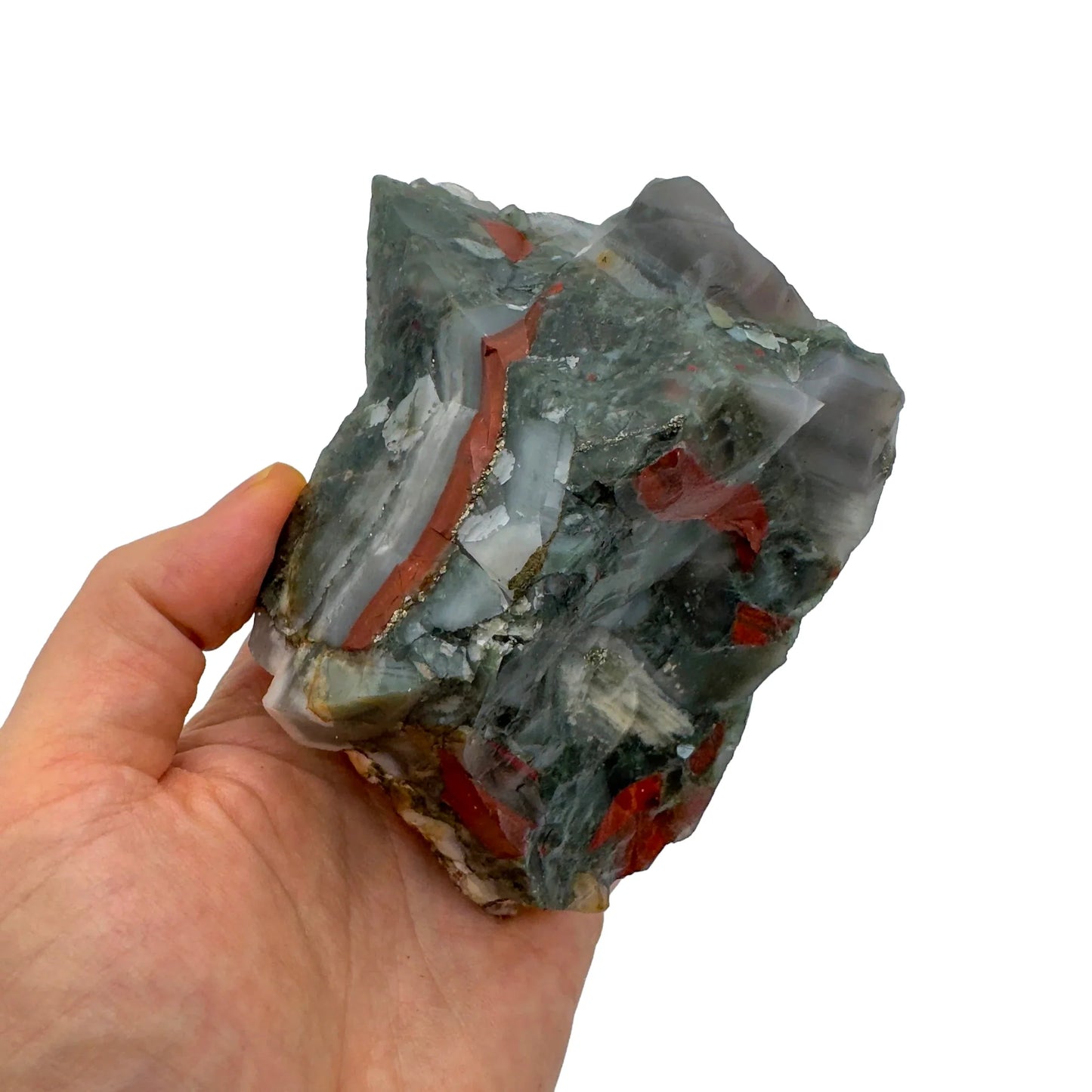Scale comparison of Bloodstone specimen, with depth visible across the surface.