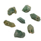 Eight A grade chlorite quartz raw crystal points from Zimbabwe, 1 to 1.50 inches, green chlorite sealed inside the quartz