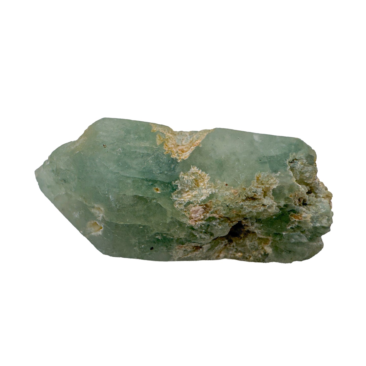 Single large chlorite quartz raw crystal point from Zimbabwe photographed alone on white