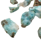 Larimar rough pieces angled to show natural broken faces and blue to white banding, 0.5 to 1 inch