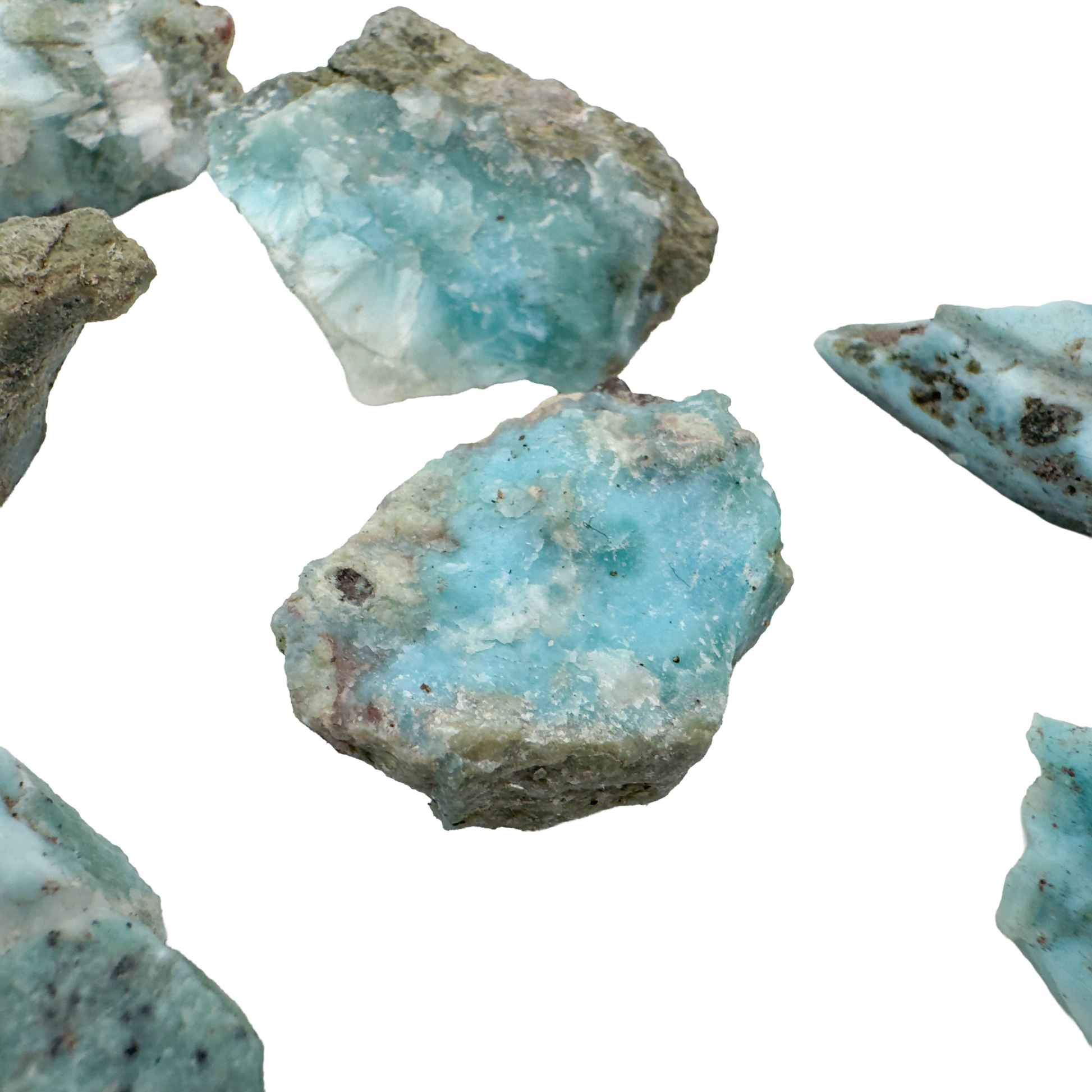 Larimar raw stone detail, jojoba oil finish deepening the natural blue, Barahona Province