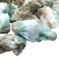 Dense pile of Larimar raw stones showing typical batch mix, A grade Dominican Republic