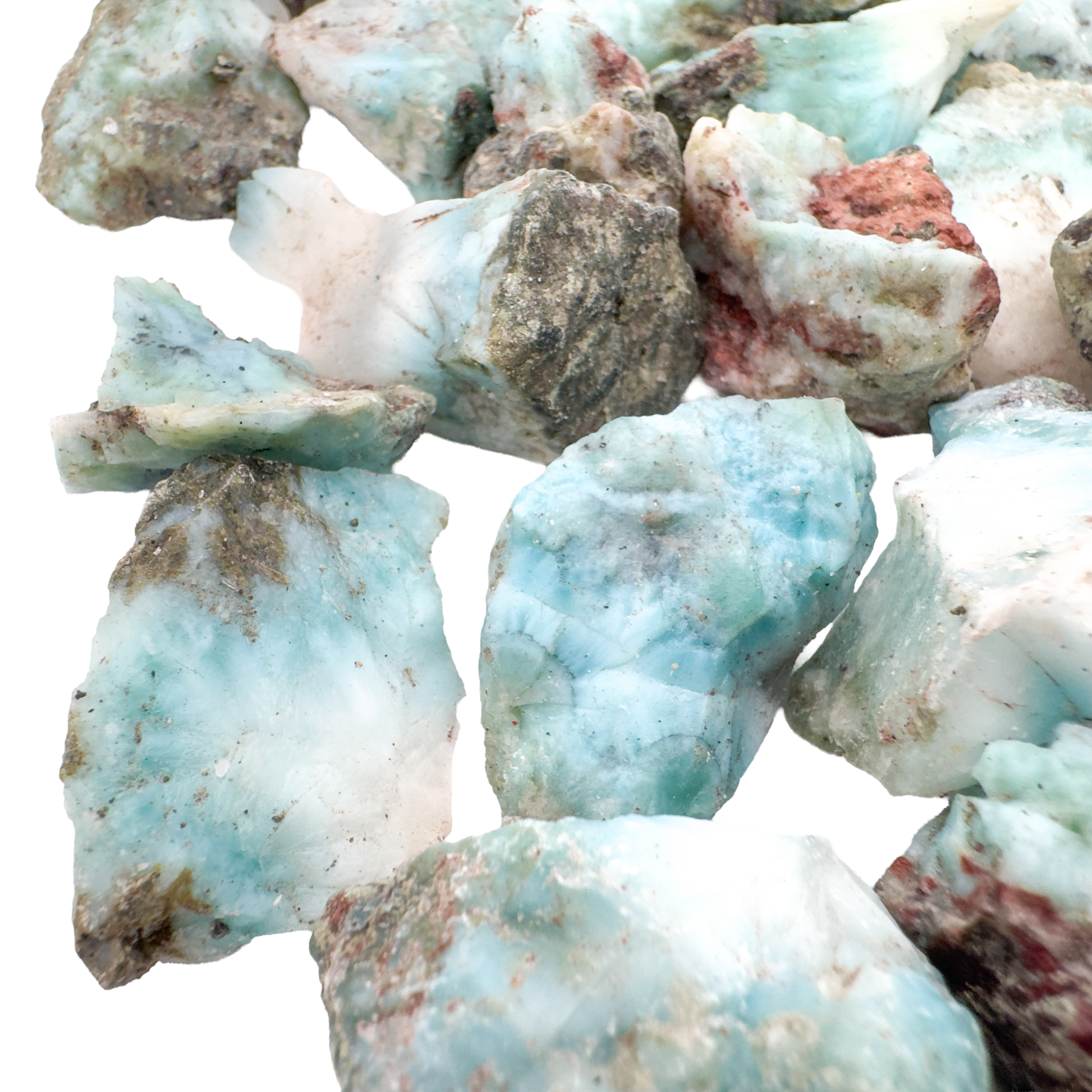 Overhead pile of A grade Larimar raw crystals from the Dominican Republic, sold by piece or pound
