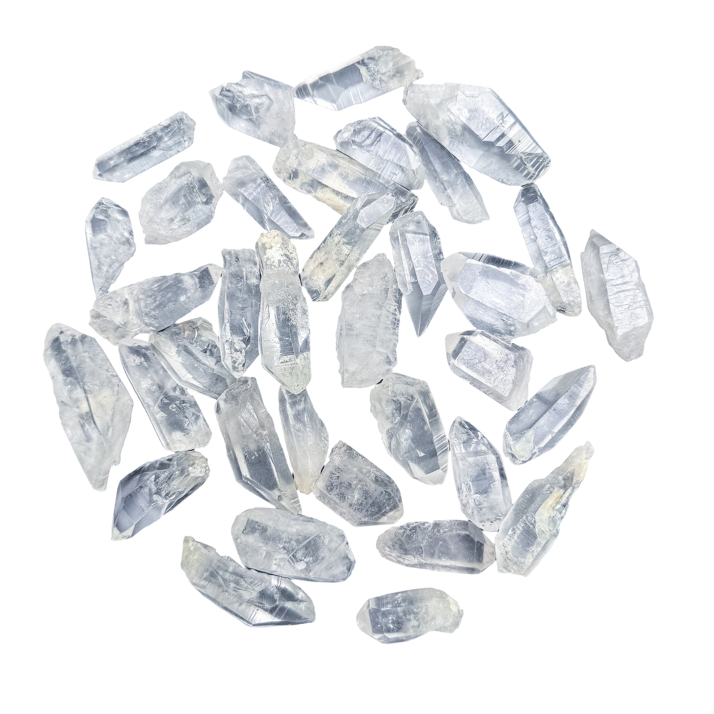 A-grade Lemurian Quartz raw points from Brazil, 24-40 pieces per pound, clarity ranging from water-clear to softly veiled.