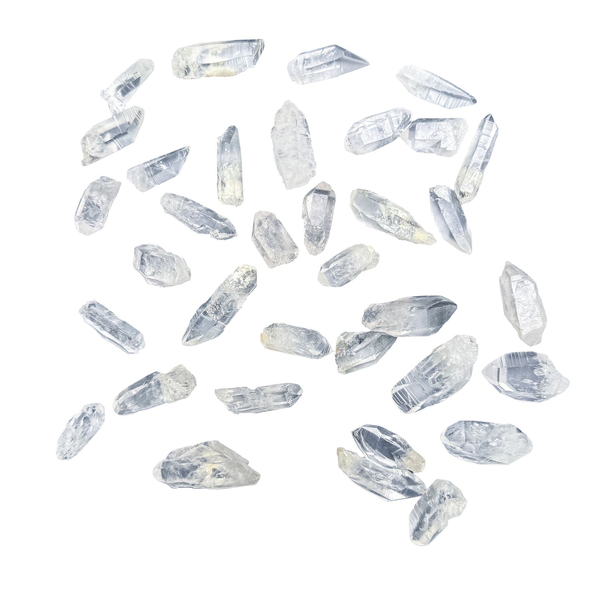 Lemurian Quartz raw crystal points arranged to show the size range of 1 to 2 inches within this batch.