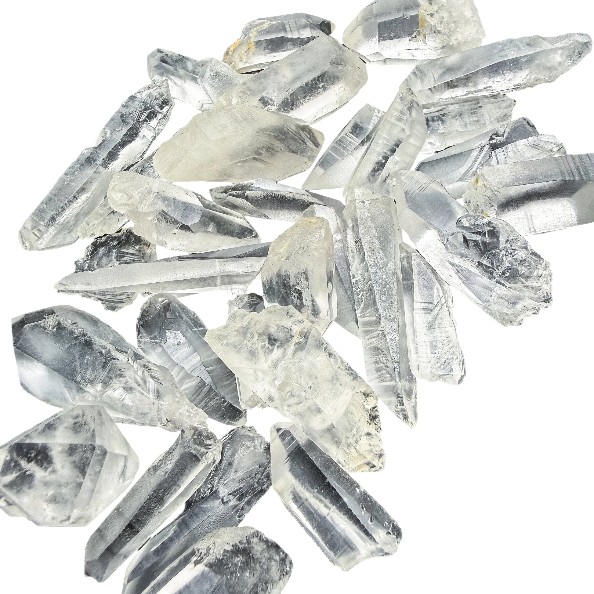 Overhead flat-lay of 0.50 to 1.50 inch Lemurian Quartz points from Brazil