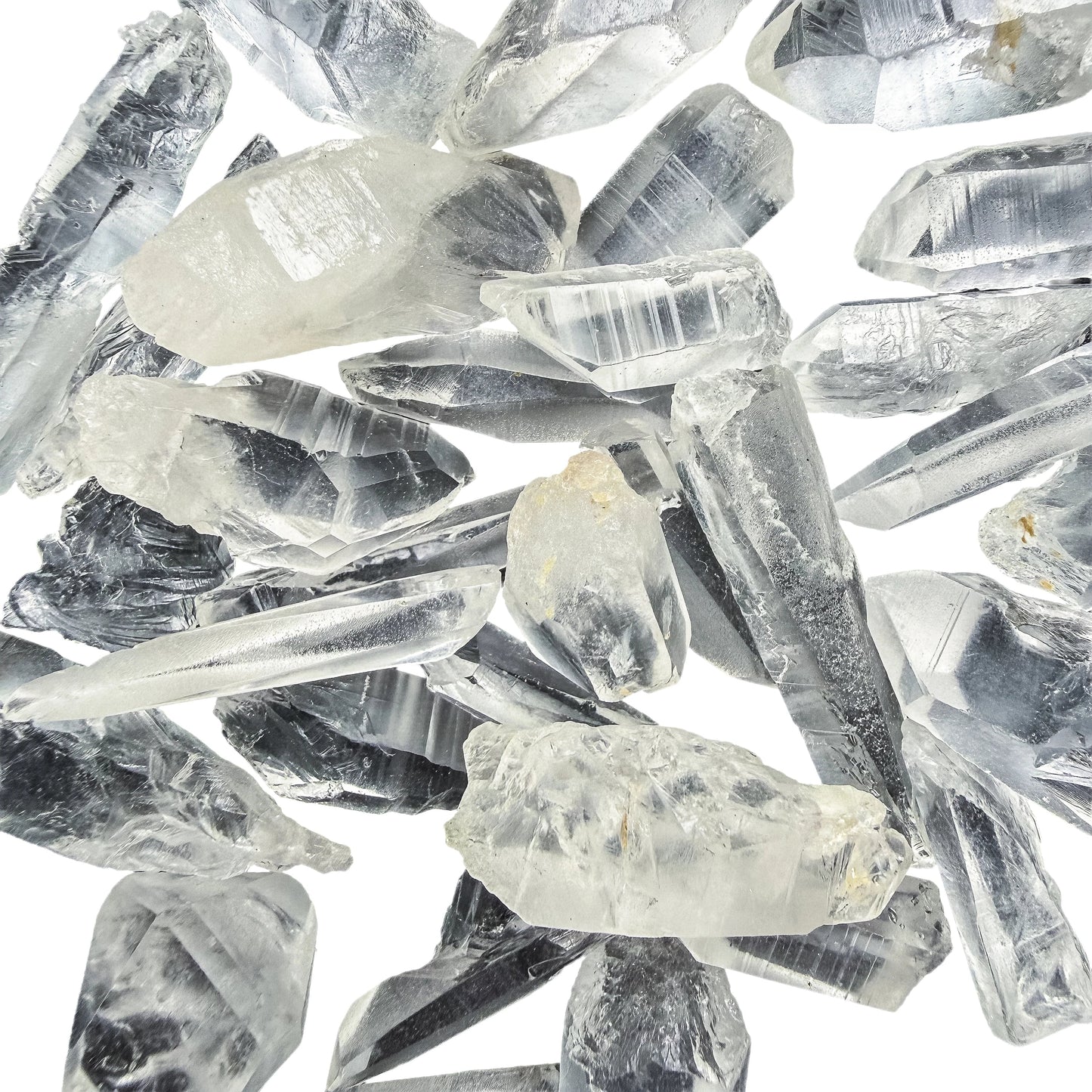 Small group of Lemurian Quartz points arranged to show length variation
