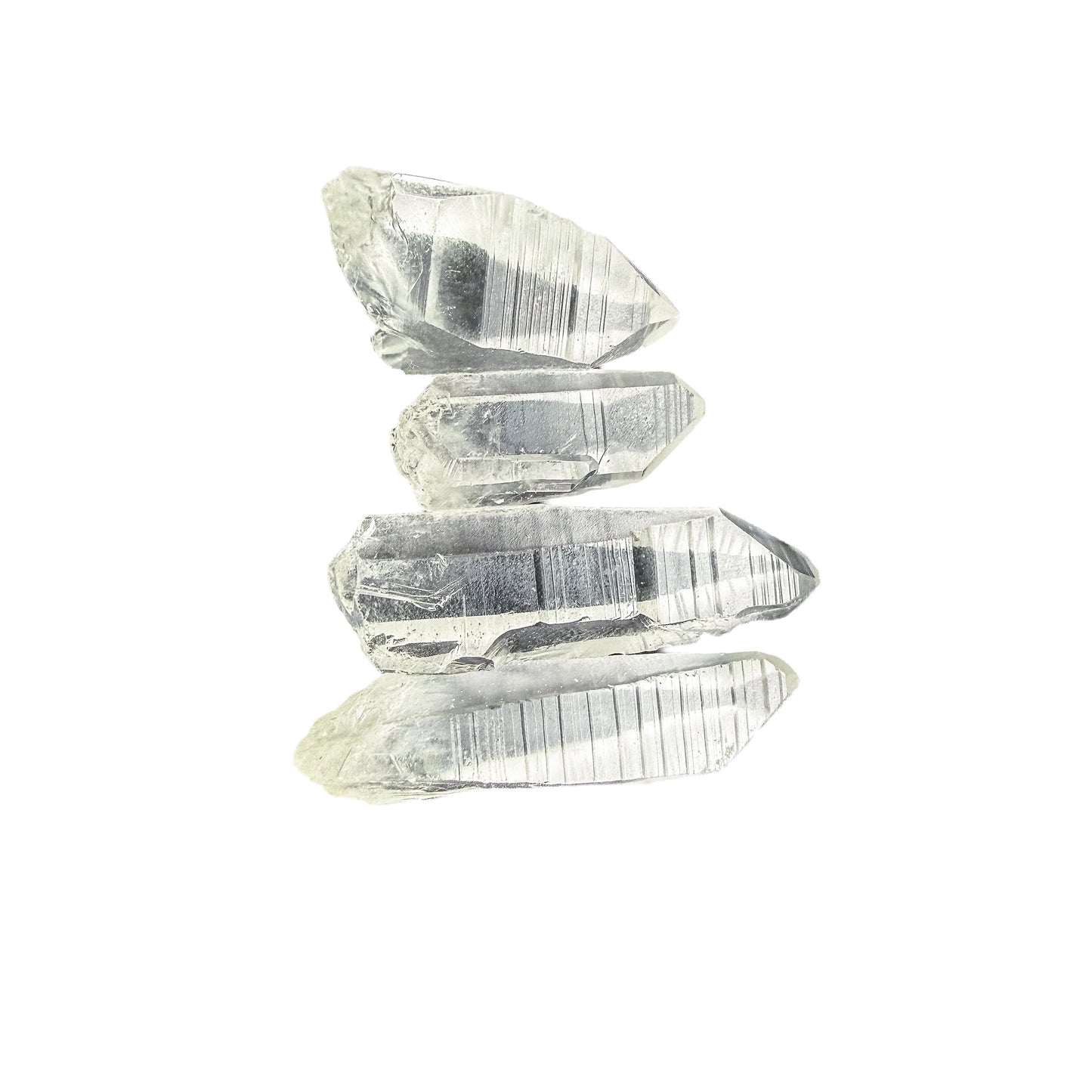 Side view of Lemurian Quartz points showing the ridged bar-code faces