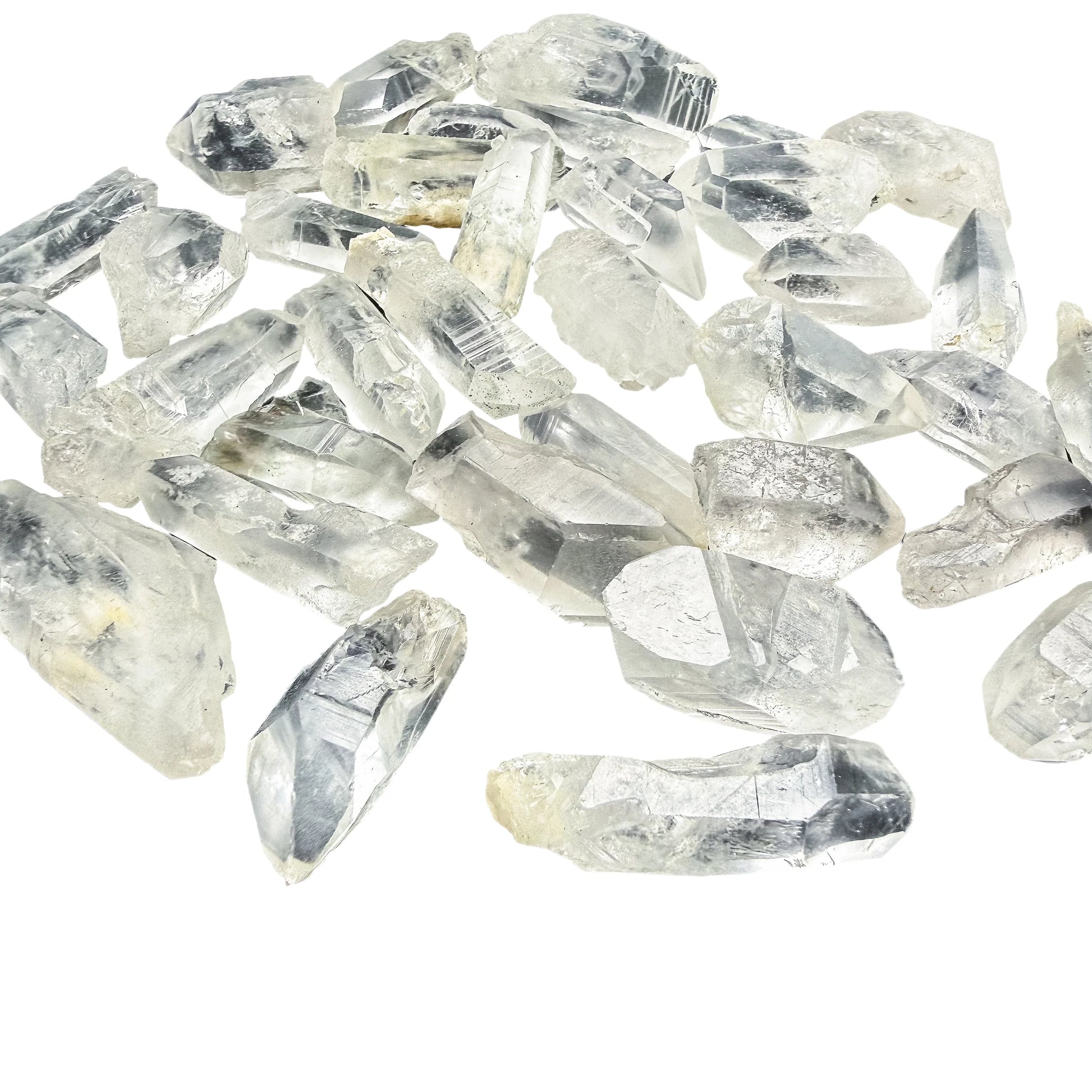 Overhead flat-lay of 1 to 2 inch Lemurian Quartz points from Brazil