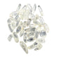 Light passing through a Lemurian Quartz point revealing internal veils