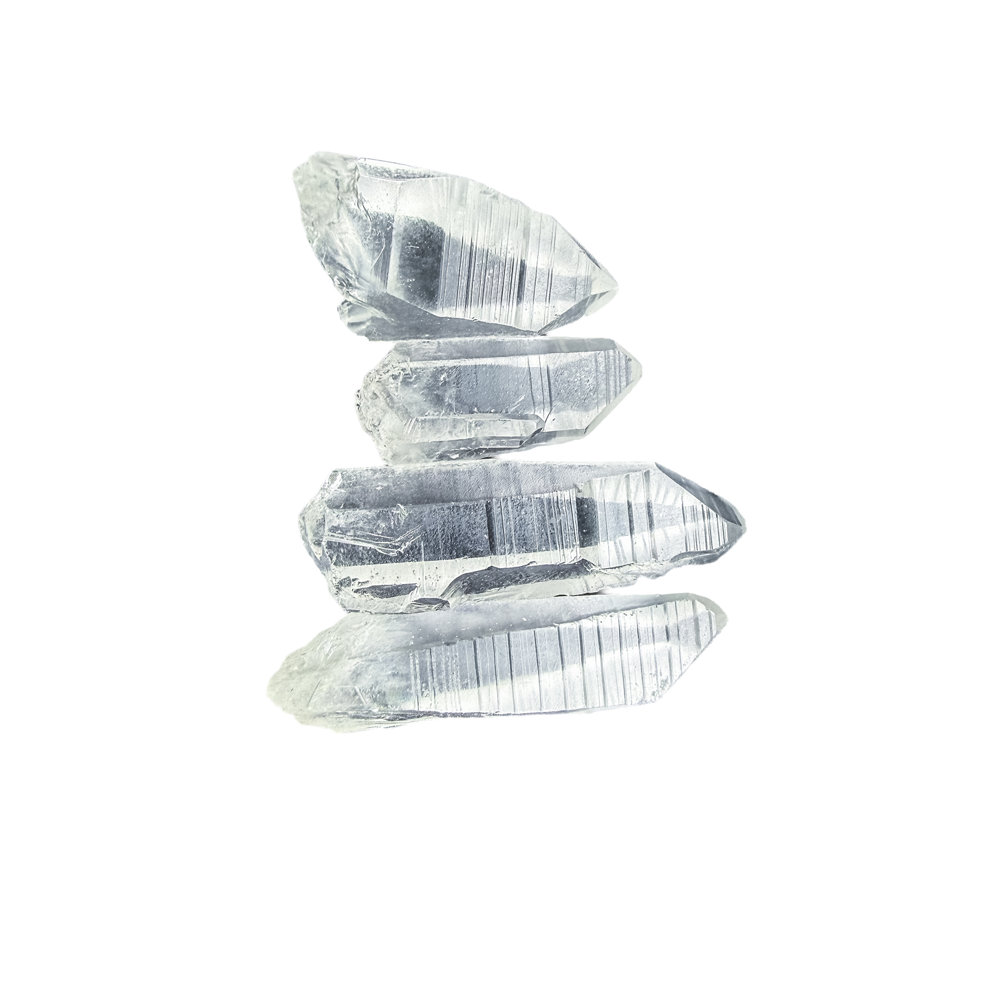 Detail of a single Lemurian Quartz point at 2 to 10 grams, its striations readable under a fingertip.