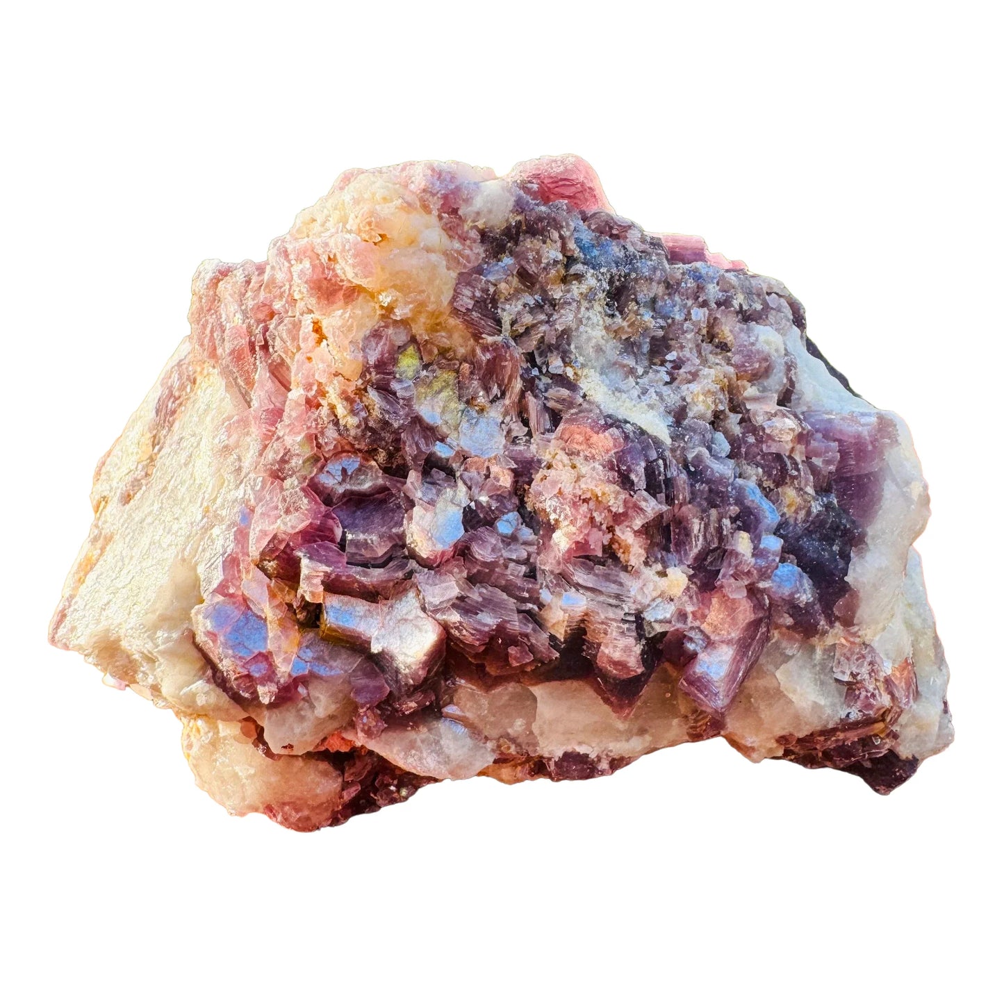 Held against neutral backdrop is a Lepidolite specimen, from Minas Gerais, Brazil, with subtle natural color showing through.