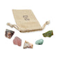 Libra Crystal Kit: lepidolite, rose quartz, pink opal, prehnite and chrysoprase, arranged with the reusable cotton bag they come in, on white