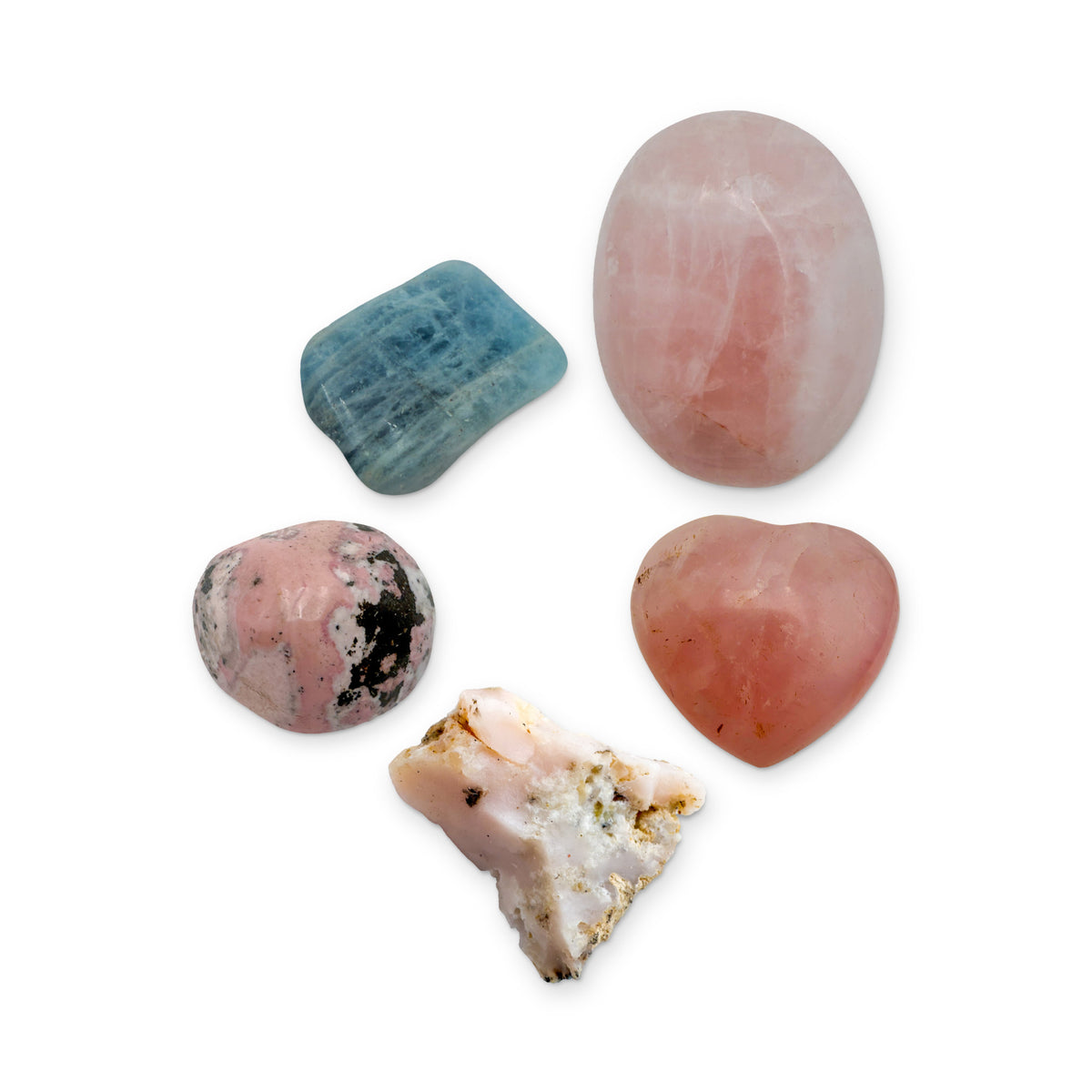 Love Crystal Kit: rose quartz palm stone, rose quartz heart, pink opal, rhodonite and aquamarine, shown together on white