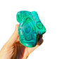 Natural light view of one Malachite specimen for scale, from Democratic Republic of the Congo.