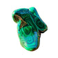 Detail shot of Grade AA Malachite specimen under natural light