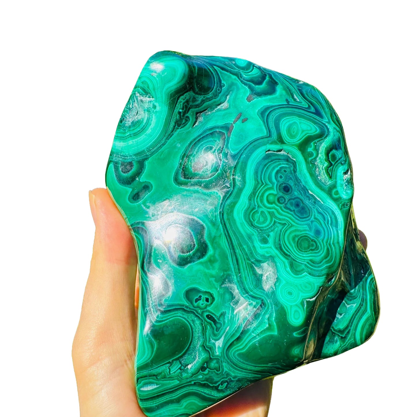 Up-close view of Malachite specimen, showing natural color depth.