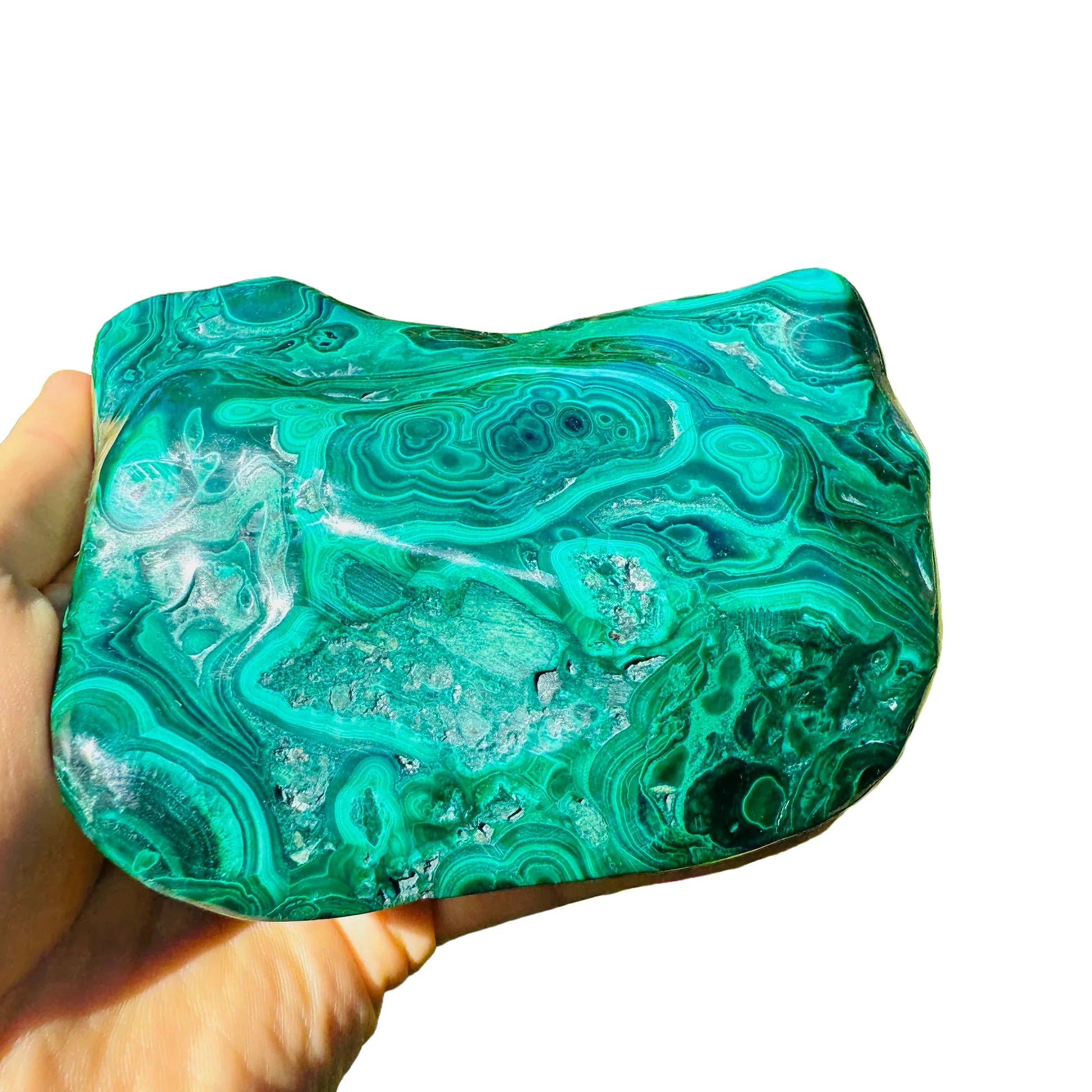 Bird's-eye view of Malachite specimen, sourced from Democratic Republic of the Congo, often worked with for Emotional Healing.
