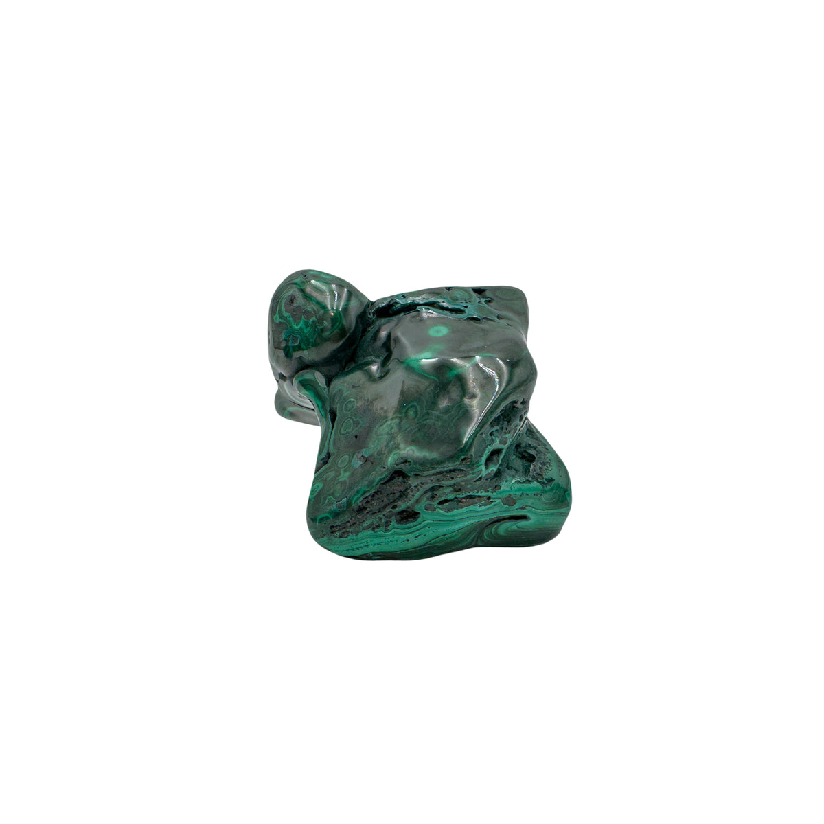 The same malachite specimen from a compact angle, with a rounded knob rising above the banded body.