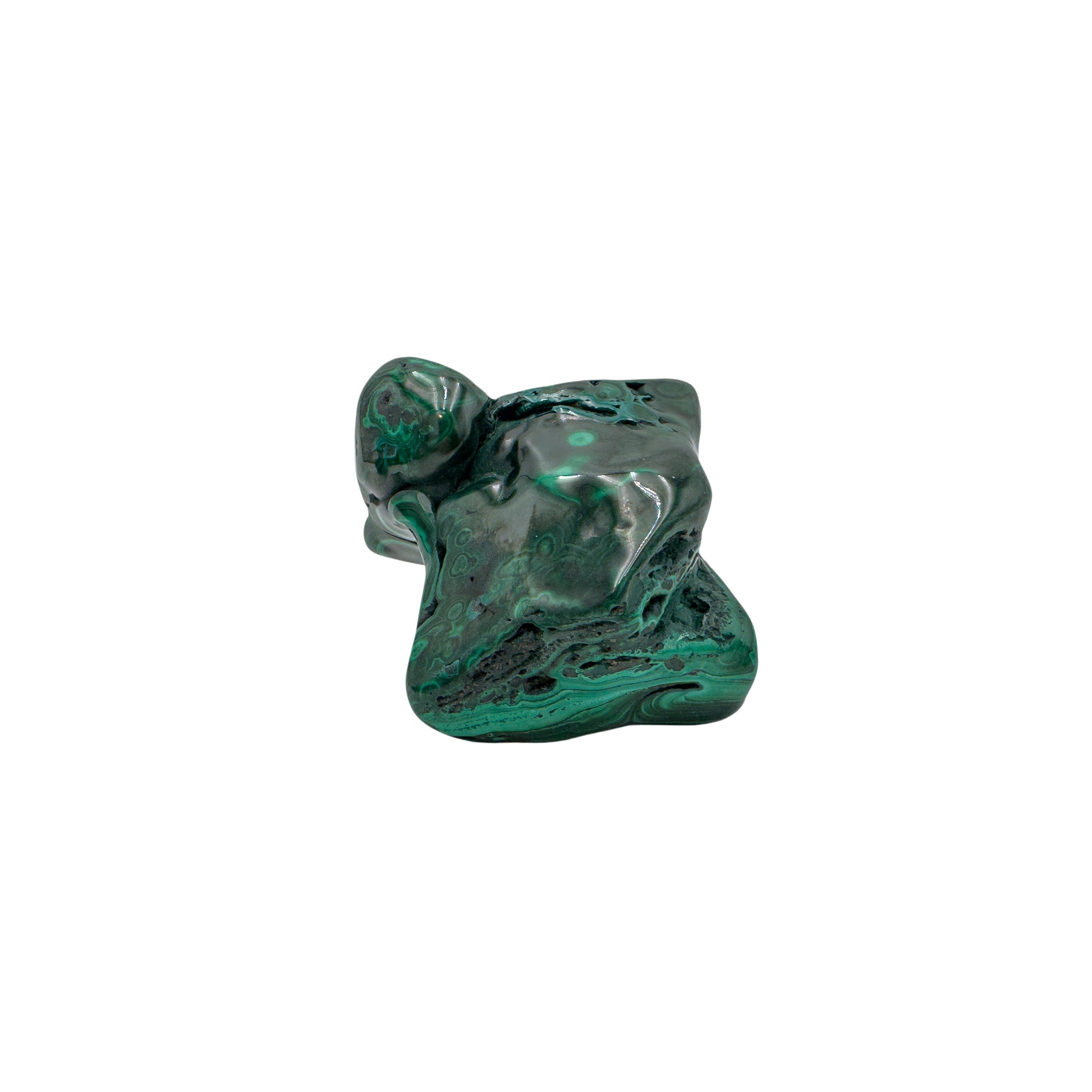 The same malachite specimen from a compact angle, with a rounded knob rising above the banded body.