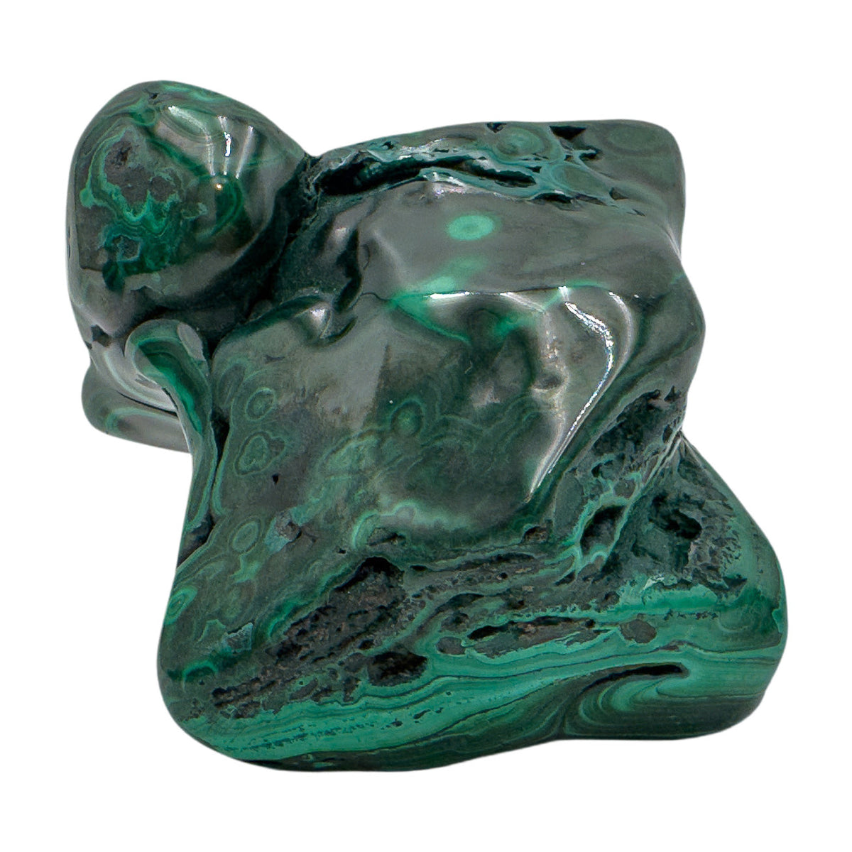 The same malachite specimen from a compact angle, with a rounded knob rising above the banded body.