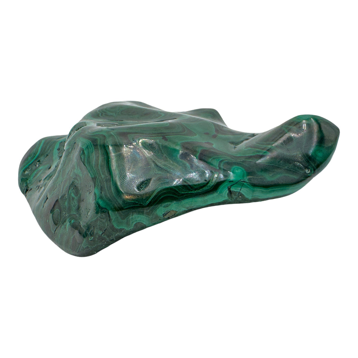Close side profile of the malachite specimen, showing the jagged natural edge where the polish meets the raw stone.
