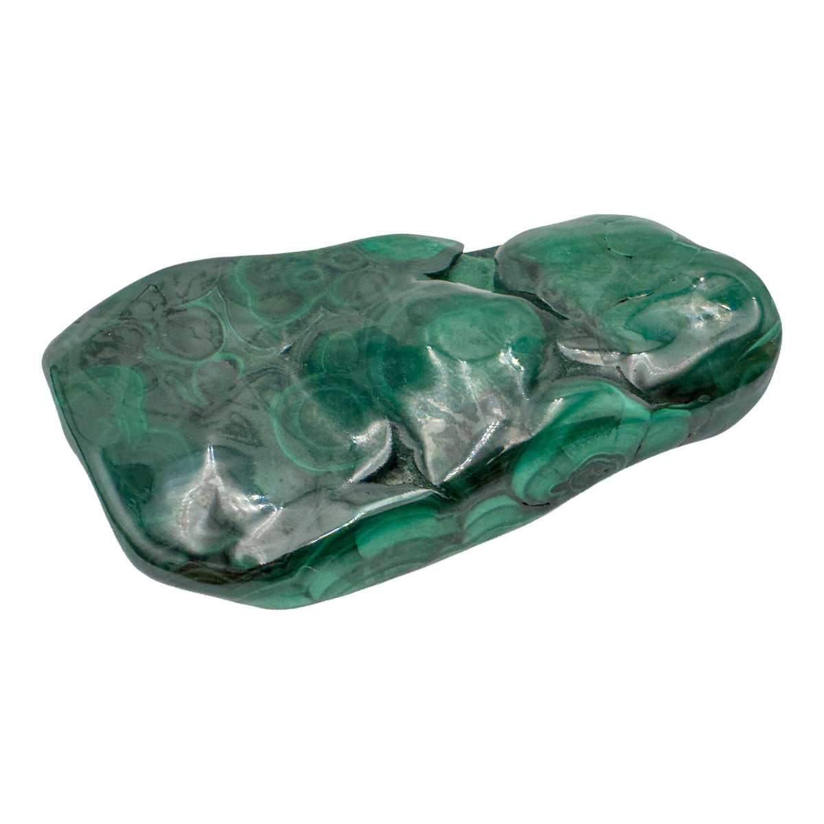 AA-grade malachite specimen from Haut-Katanga, Democratic Republic of the Congo, shown lengthwise from a low side angle across its elongated shape.