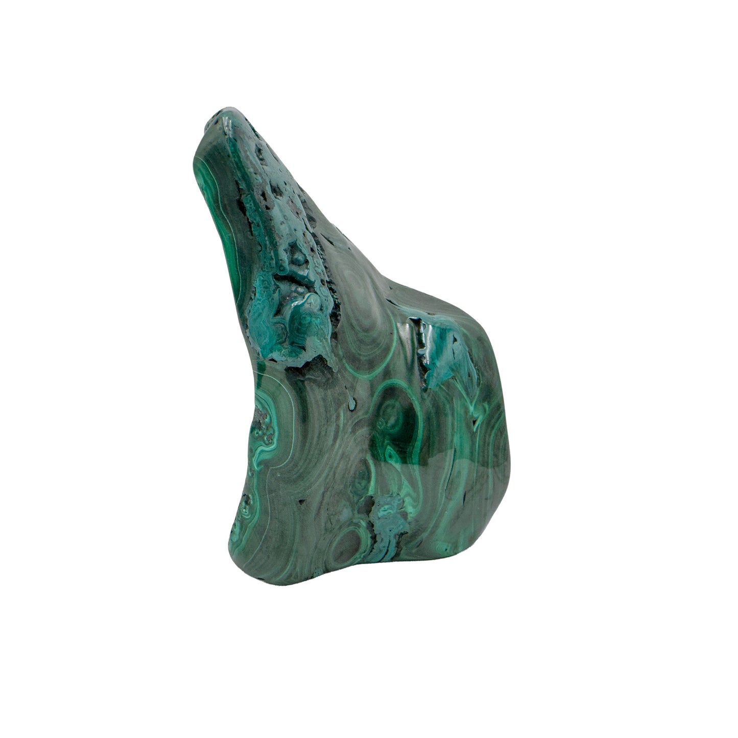 Side angle of the malachite specimen's chunkier face, with softer, less defined banding.