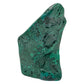 Narrow profile of the malachite specimen showing a plainer gray-green face with faint banding.