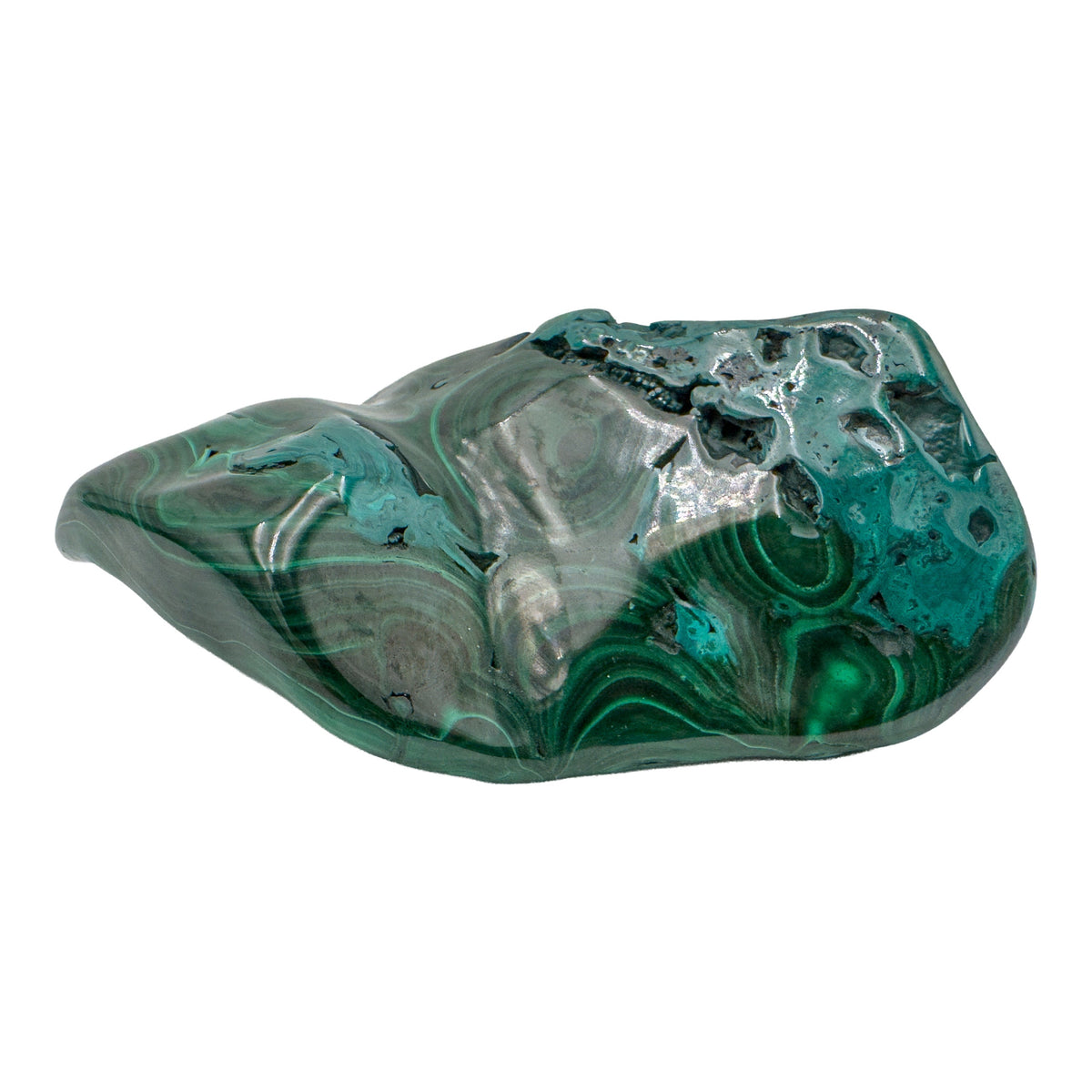 The same malachite specimen from a mirrored angle, showing concentric green rings across the lower two-thirds of the stone.
